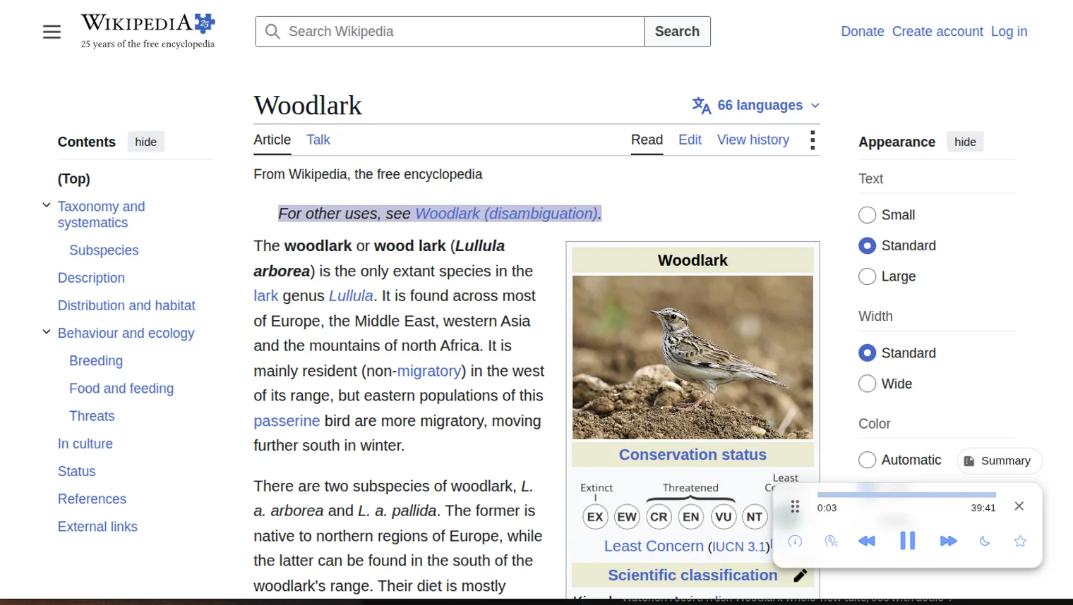 Lullula reading a Wikipedia article with the current sentence highlighted and its floating player showing progress and controls.